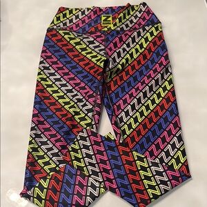Zumba Fitness Red and Pink Leggings Vibrant Geometric Design